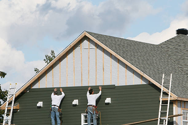 Professional Vinyl Siding technician working in Watertown, MA